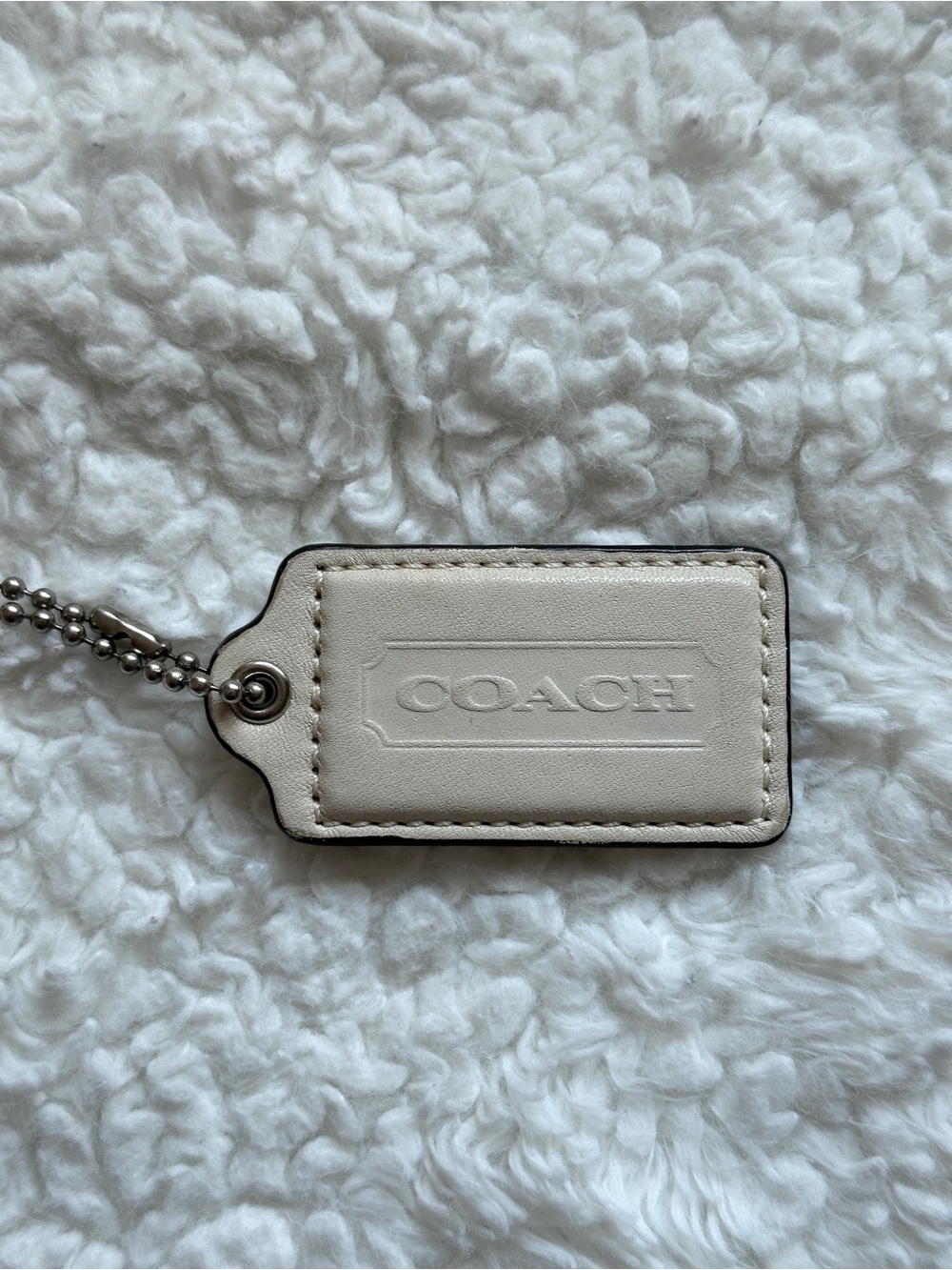 Coach Hang Tag in Cream